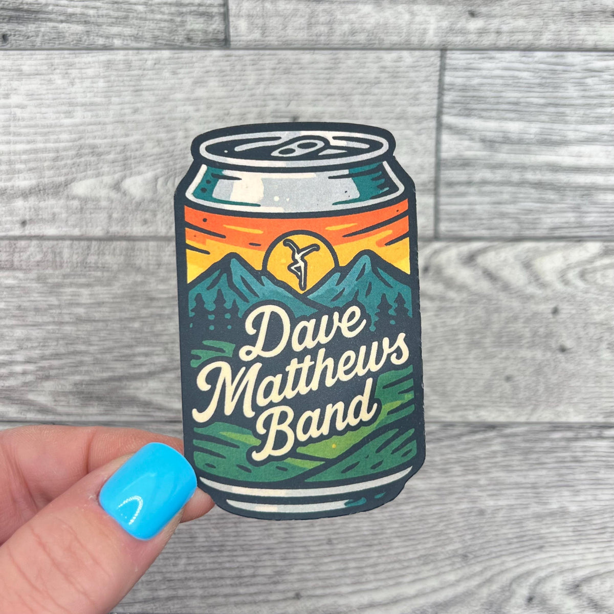DMB Beer Soda Pop Can Orange Yellow Sunset Dark Blue Green Mountains Vinyl Sticker Slap 3" x 1.85" Matte Finish